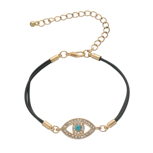 Detail of Fatima Evil Eye bracelet featuring blue stone, white crystals and black cord
