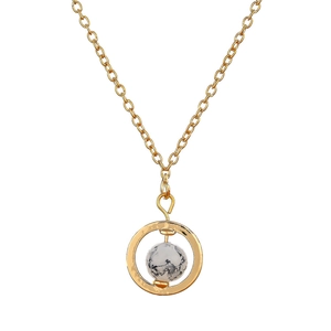Collier bohème doré avec pendentif rond orné d'une perle en marbre noir et blanc chic