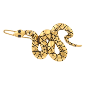 Golden alloy snake hair clip with intricate diamond pattern engraving on a white background