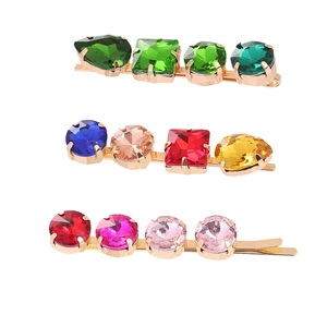Minimalist geometric alloy hairpins set with colorful rhinestones on a white background