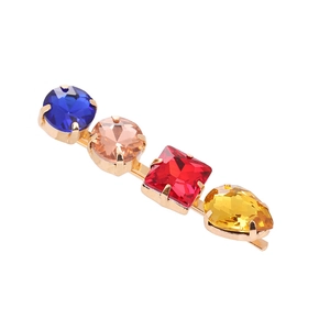Minimalist geometric alloy hair clip with colorful rhinestones on a gold base