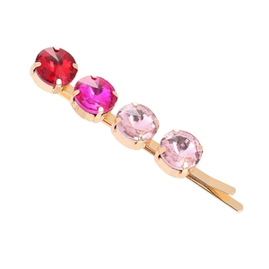 Geometric alloy hair clip with gradient red and pink rhinestones on a gold base