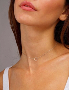 Elegant silver-plated circle pendant choker necklace with beaded chain on a model