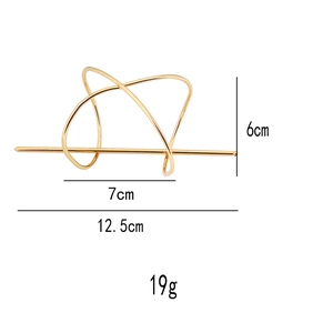 Detailed dimensions of the gold geometric hair pin showing length and weight measurements
