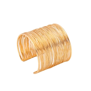 Fashionable multilayer woven wire cuff bracelet in gold finish with wide open design