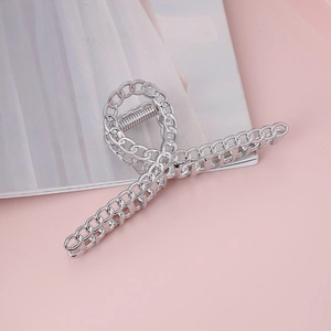 Silver metal chain hair claw clip with a modern minimalist design for women's hairstyles