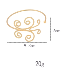 Detailed size specifications for a gold cutout spiral pattern arm cuff with dimensions