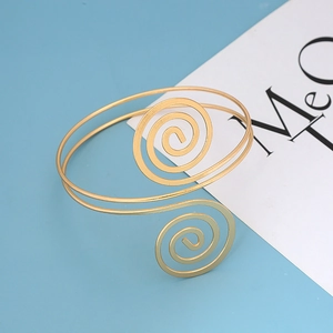 Bracciale da braccio a spirale dorato minimalista con design geometrico a doppia linea