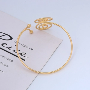 Adjustable golden double-layer spiral arm cuff featuring round bead open design