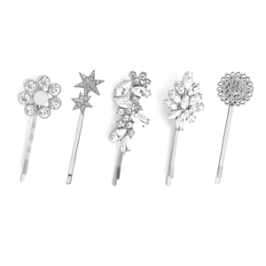 Set di cinque fermagli per capelli in argento con strass lucidi e motivi floreali