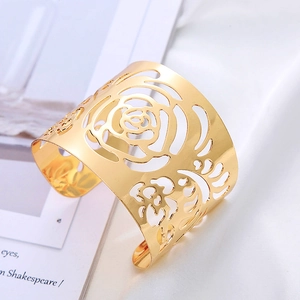 Exaggerated gold hollow rose flower cuff bracelet with creative cutout metal design