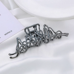 Elegante pinza per capelli cava e irregolare in metallo grigio per acconciature raffinate