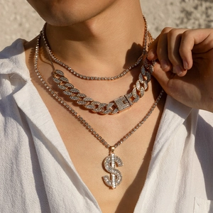 Men's layered Cuban link necklace with sparkling iced out dollar sign pendant in gold