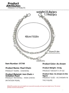 Detail view of double-layered hip-hop trouser chain with pearls and silver metal links