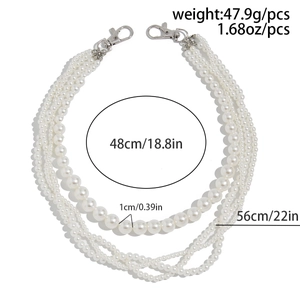 Detail of multilayer pearl chain with silver lobster clasps, lengths 48cm and 56cm