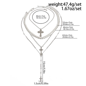 Detailed view of layered pearl necklace set with cross pendants and size measurements
