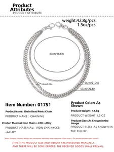 Detail view of silver multi-layer metal hip-hop trouser chain with beads and lobster clasps