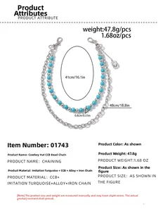Detailed close-up of double-layer waist chain with turquoise beads and silver metal chain