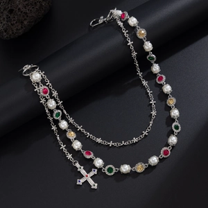 Detail of hip hop waist chain with colorful zircon, pearls and crystal cross pendant
