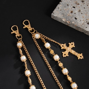 Golden pearl cross pants chain with intricate hollow charms and hip hop style lobster clasp