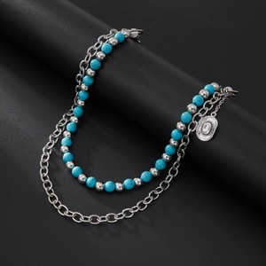 Fashionable turquoise beaded layered waist chain with vintage silver pendant and metal links