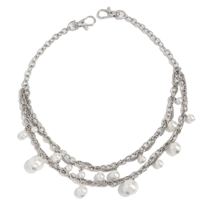 Layered silver metal waist chain with faux pearls and lobster clasps on white background