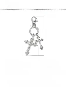 Detailed view of silver cross keychain dimensions and metal alloy product specifications