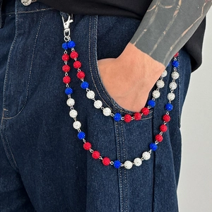 Detail of double-layer hip-hop trousers chain with red, white and blue rhinestone beads