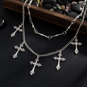 Detail of gothic multi-layer chain with thorns design and five relief cross pendants