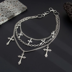 Detail view of multi-layer hip-hop metal waist chain with cross pendants and lobster clasps