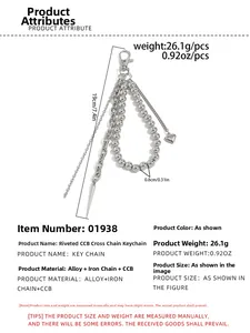 Detail view of punk silver multilayer pant chain with rivets and heart charm pendants