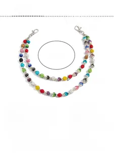 Detail of colorful rhinestone bead pant chain with dual silver lobster clasps for men