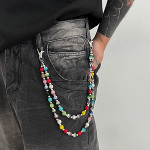 Close-up of double-layered hip-hop waist chain with vibrant colorful rhinestone beads