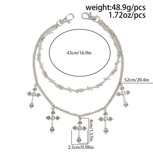 Detail showing gothic silver punk trouser chain with thorns design and cross pendants