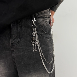 Punk style metal waist chain with skeleton pendant on denim jeans for men and women