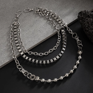 Detail of silver layered chain with ball links and square box links for streetwear fashion