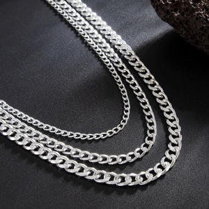 Detailed view of layered silver punk metal wallet chains for street style fashion pants