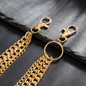 Multi-layer gold metal hip hop waist chains with lobster clasps on textured stone