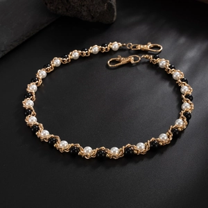 Hip-hop style layered pearl trouser chain with gold links and black and white pearls