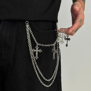 Detail view of triple-layered silver pant chain with vintage cross pendants for men