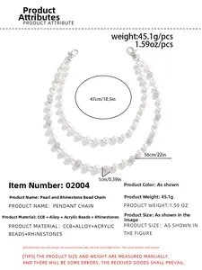 Detail view of pearl and rhinestone pant chain with dimensions 47cm and 56cm
