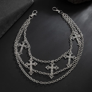 Detail shot of vintage silver-tone multi-layered pants chain with five ornate crosses
