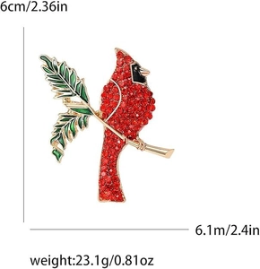 Dimensions détaillées d'une broche cardinale avec des strass rouges et des feuilles vertes