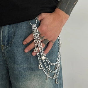 Hip hop silver multi-layer waist chain with sun moon and star charms on denim pants
