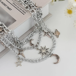Silver multi-layer hip hop chain necklace featuring sun moon and star charms