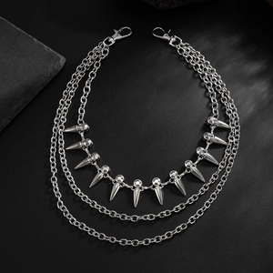 Three-layer silver metal pants chain with studded cone pendants and crystal details