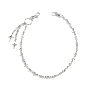 Silver metal punk pants chain with star charms and lobster clasps on white background