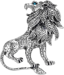 Close-up of vintage silver lion brooch with detailed mane and blue rhinestone eye detail