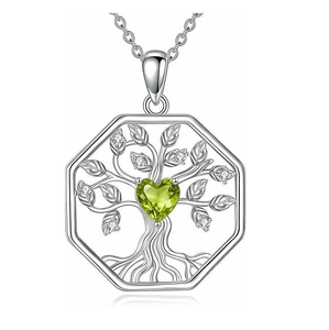 Detail of Tree of Life pendant with octagonal frame and heart-shaped green gemstone