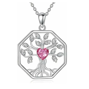 Detailed close-up of Tree of Life necklace with pink heart gem and hexagonal frame